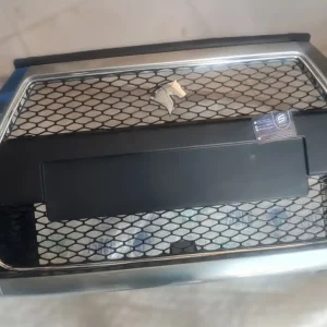سپر جلو دناپلاس خاکستری متالیک ۷۹۱۵ با جلو پنجره مهرکام پارس ایساکو